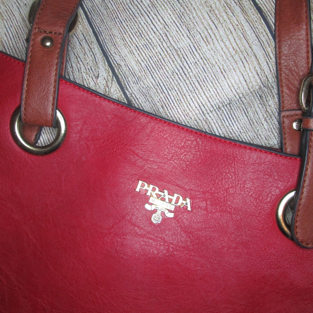 prada marron red acordion bag